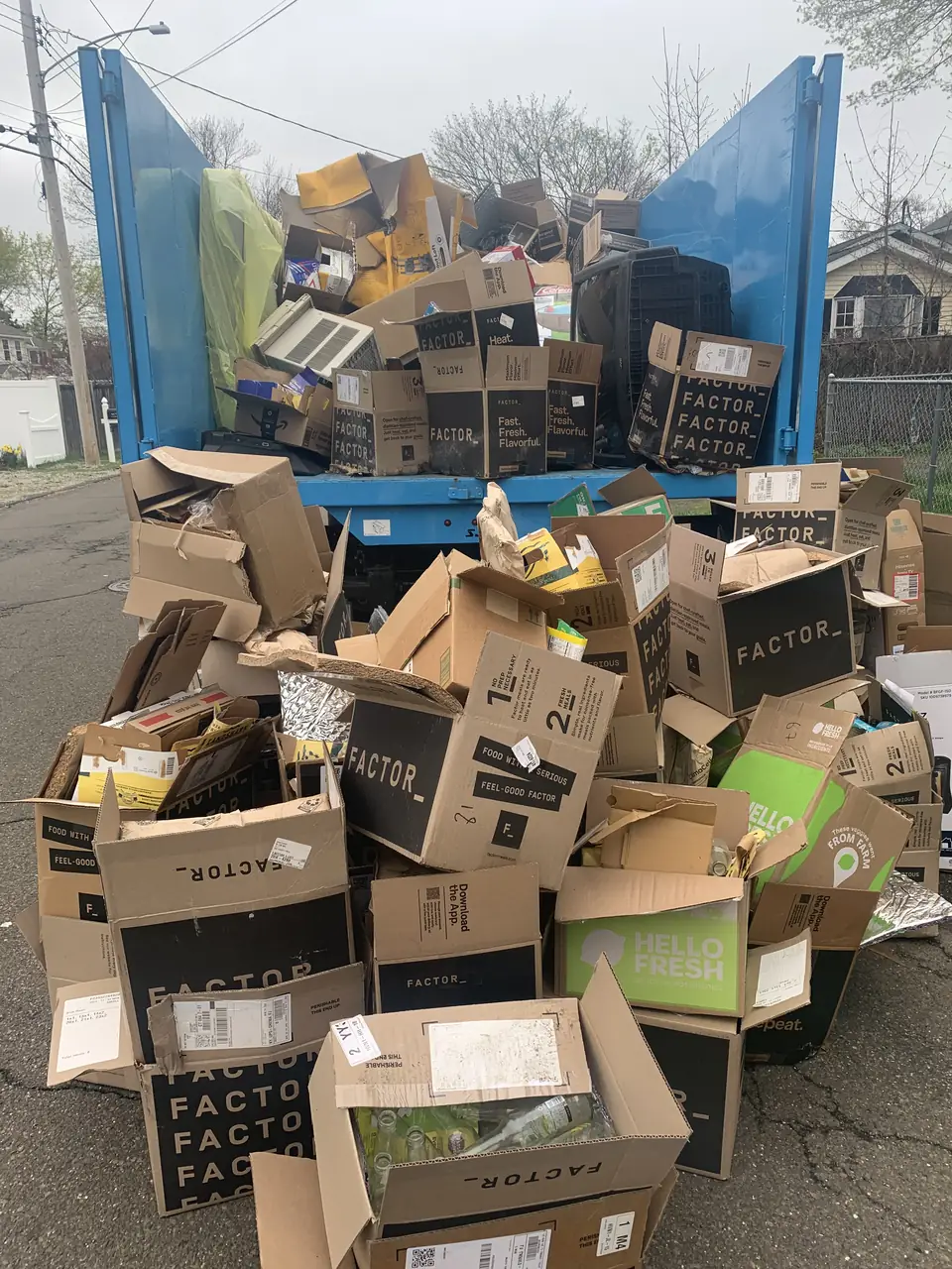 Junk Panthers truck loaded with boxes and household junk